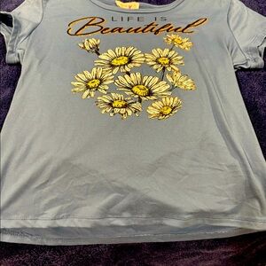 A cute blue blouse for spring. For girls